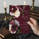 Dark Elegant Burgundy & Cream Floral Wedding Invitation<br><div class="desc">Step into a realm of exquisite elegance with our floral dark and moody wedding invitation. Designed to captivate the senses, this invitation boasts a striking burgundy background adorned with a breathtaking burst of rich burgundy and cream roses, pale lavender grey hydrangeas, and other mixed florals in soft white and palest...</div>