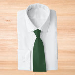 Dark Emerald Green Solid Color Tie<br><div class="desc">A rich and earthy shade of forest green. This color evokes the dense foliage of ancient woodlands and the refreshing scent of pine. This sophisticated green is known for depth and elegance. This timeless hue offers a harmonious blend of calm and vibrancy. Elevate your space with the understated charm of this lush green shade.</div>