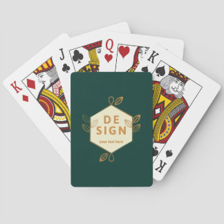 Dark green “DE SIGN” card with gold floral