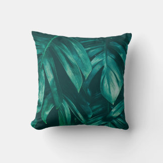 Dark green, tropical jungle foliage. cushion