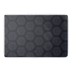 Dark grey hexagonal slightly darker grey backgrond bath mat