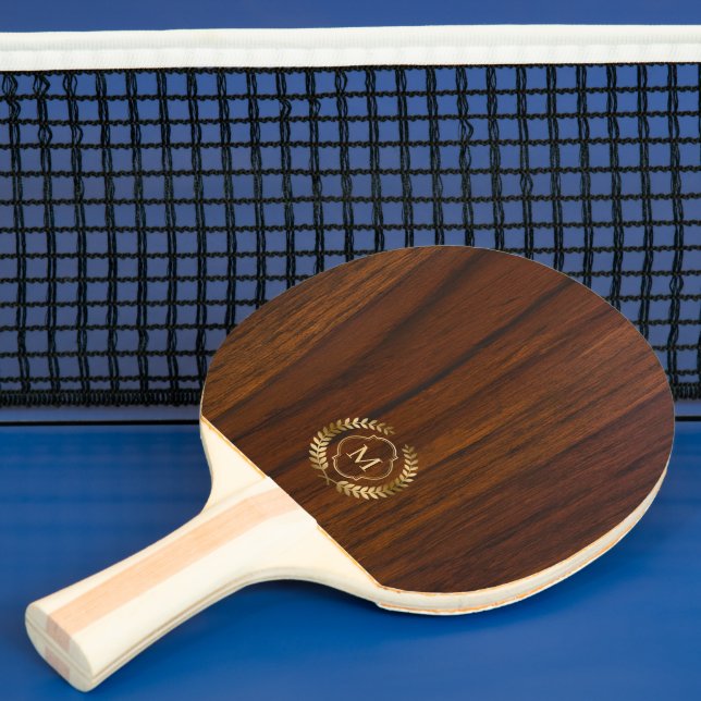 Dark mohagony wood gold badge monogram ping pong paddle (Insitu)