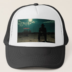 Dark Outlaw Sitting in the Desert Trucker Hat