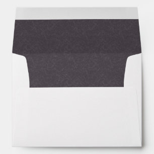 Dark purple textured surface swirling pattern envelope