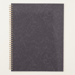 Dark purple textured surface swirling pattern planner