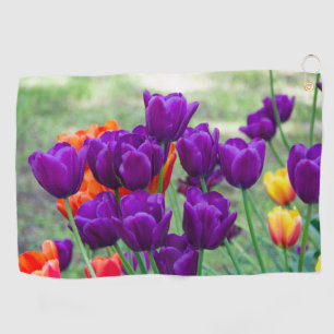 Dark purple tulips on a sunny day in the garden golf towel