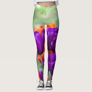Dark purple tulips on a sunny day in the garden leggings