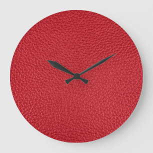 Dark red artificial leatherette closeup. large clock