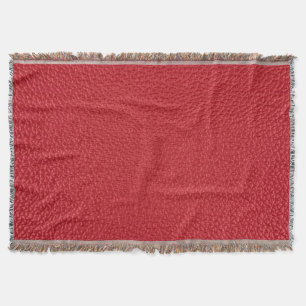 Dark red artificial leatherette closeup. throw blanket