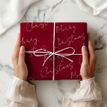 Dark Red Merry Christmas  Wrapping Paper<br><div class="desc">Traditional,  plain-coloured wrapping paper. A modern Bohemian dark red with Merry Christmas in handwritten font printed in a repeating pattern. Dark Red Merry Christmas Wrapping Paper.</div>