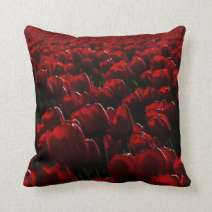 Dark red tulip throw pillow. cushion