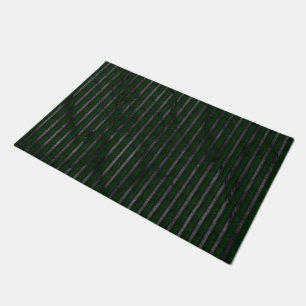 Dark rough stripes over stained abstract design doormat