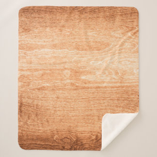 Dark wood texture background surface with old natu sherpa blanket