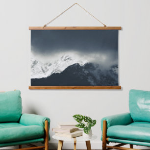 Darkness and light on snow covered mountains hanging tapestry