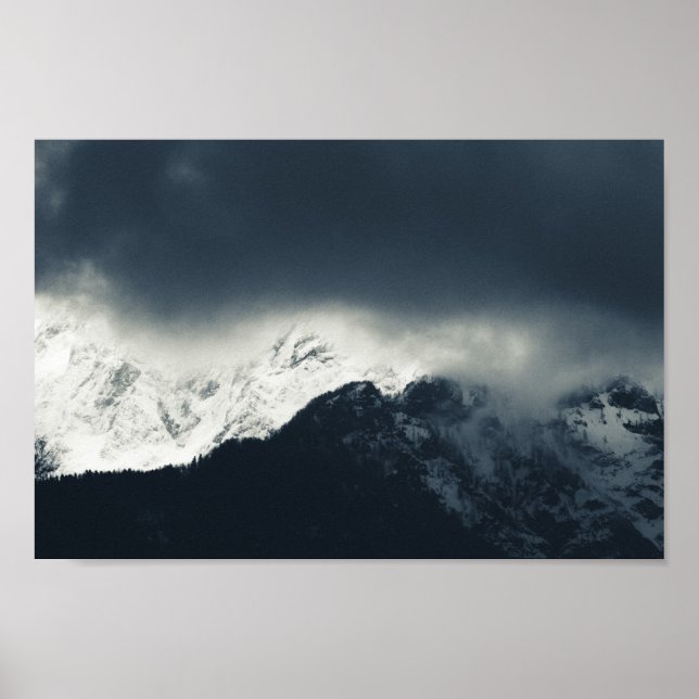 Darkness and light on snow covered mountains poster (Front)