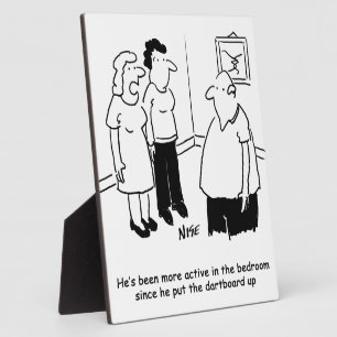 Dartboard in the Bedroom. Funny Cartoon Plaque