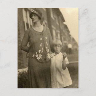 daughter by mother and building postcard