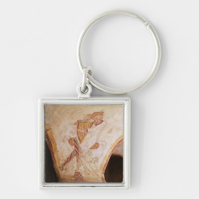 David playing on the harp key ring (Front)