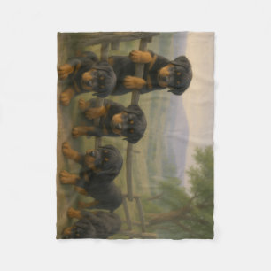 Dawn Companions: Rottweiler Puppies on the Hill Fleece Blanket