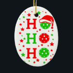 Deck the Halls with Pickleballs Christmas Ceramic Ornament<br><div class="desc">This Christmas pickleball Ornament makes a perfect gift for any pickleball lover. The front has a green pickleball with a Santa hat and text that says "Deck the Halls with Pickleballs." On the back, the design features a HO HO HO graphic where the letter O is replaced with a pickleball....</div>