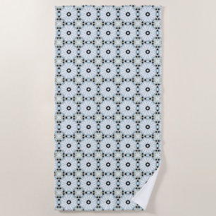 Decorative black and white circular patterned beach towel
