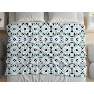 Decorative black and white circular patterned fleece blanket