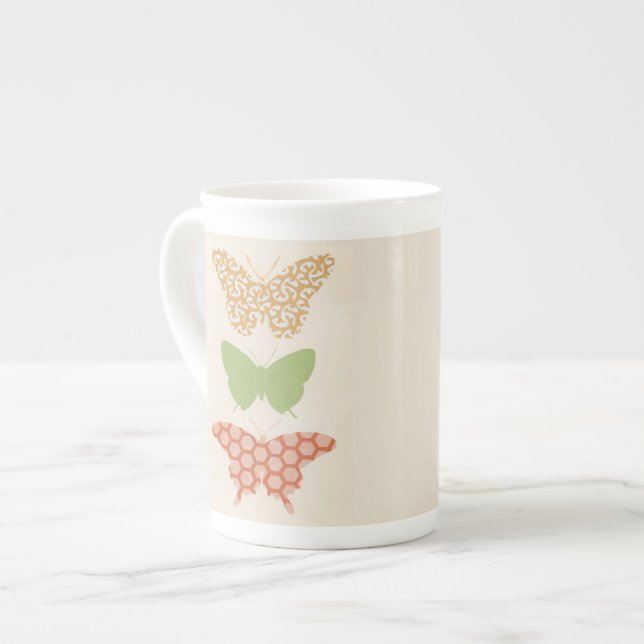 Decorative Butterfly Patterns on Cream Background Bone China Mug (Front Left)