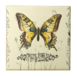 Decorative Butterfly with Wildflowers Ceramic Tile<br><div class="desc">A brightly coloured, decorative butterfly is the subject of this piece by Jennifer Goldberger. Wildflowers are drawn on the sides and underneath the huge butterfly. A lovely pastel border completes the scene. Order your print today!</div>