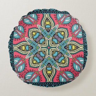 Decorative colourful ornament on a black backgroun round cushion