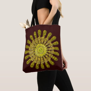 Decorative golden sun symbol tote bag