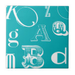Decorative Letters on Blue Background Ceramic Tile<br><div class="desc">A veritable alphabet soup awaits you when you purchase this print of decorative letters on a blue background. A Vision Studio creation,  this would be a great addition to a kid's room or their playroom. Order a print today!</div>