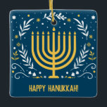 Decorative Menorah Hanukkah Ceramic Ornament<br><div class="desc">Make sure you include Hanukkah while you're celebrating Christmas or add it to your Chanukah decor. This decorative Hanukkah ornament features a gold menorah surrounded by leaves, stars, and swirls against a rich blue background. Add your own message on the reverse or delete it to leave it blank. Great for...</div>