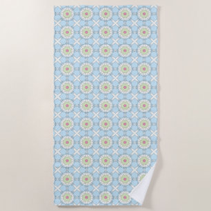 Decorative pastel blue geometric patterned beach towel