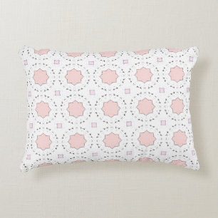 decorative pillow featuring a geometric pattern