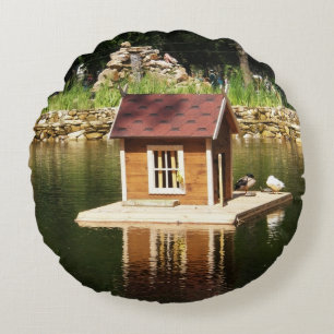 Decorative pond with bird house and alphine slide round cushion