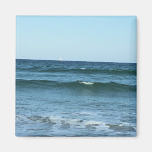 Deep Blue Waves With Distant Sailboat Magnet
