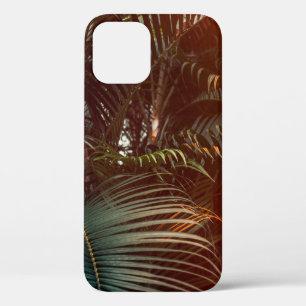 Deep dark green palm leaves pattern with bright or iPhone 12 case