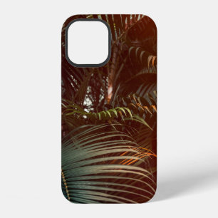 Deep dark green palm leaves pattern with bright or iPhone 12 case