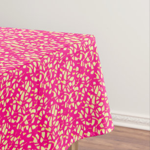 Deep pink with tiny lemon and cream patterns on it tablecloth