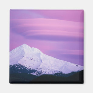 Deep purple clouds surround Mount Hood, in Magnet
