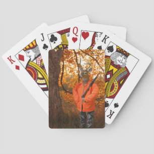 Deer dunter in woods playing cards