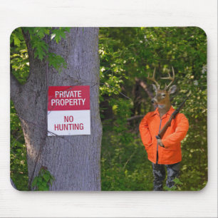 Deer hunter with rifle in woods mouse pad