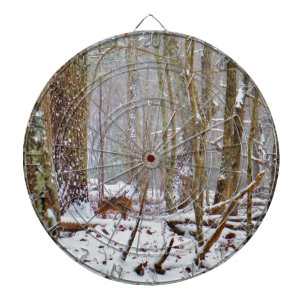Deer in the snow, licking leg dartboard