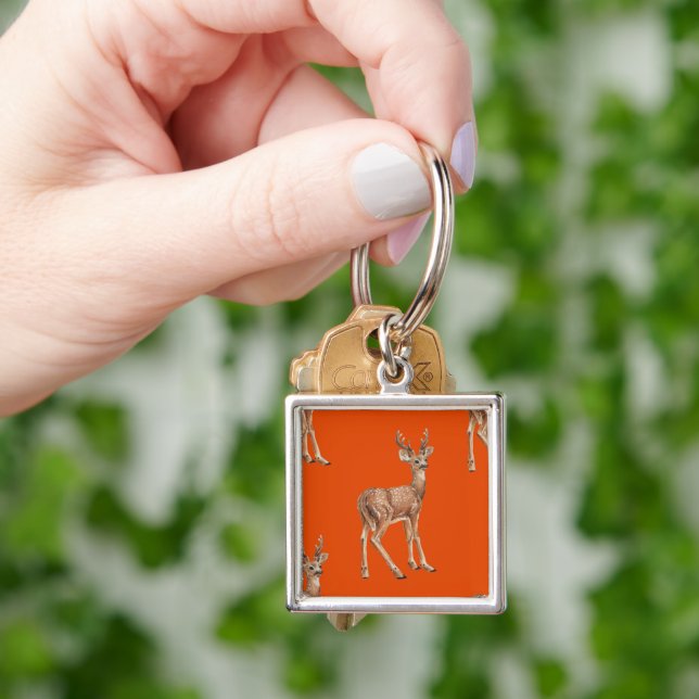 Deer on red key ring (Hand)