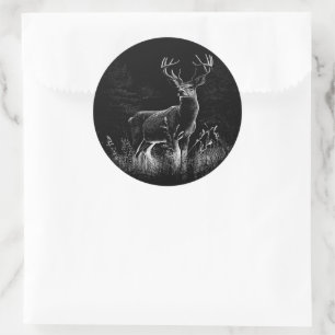 Deer with antlers framed by field and tree classic round sticker