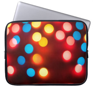 Defocused christmas lights. New Year bokeh. Abstra Laptop Sleeve
