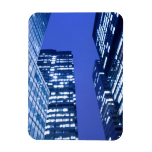 Defocused upward view of office building windows magnet