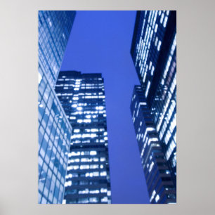 Defocused upward view of office building windows poster