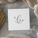 Delicate Black Calligraphy Monogram Wedding Napkin<br><div class="desc">This delicate black calligraphy monogram wedding napkin is perfect for a modern wedding reception. The romantic minimalist design features lovely and elegant black typography on a white background with a clean and simple look. Personalise the napkins with your last initial. These napkins can be used for the wedding reception, rehearsal...</div>