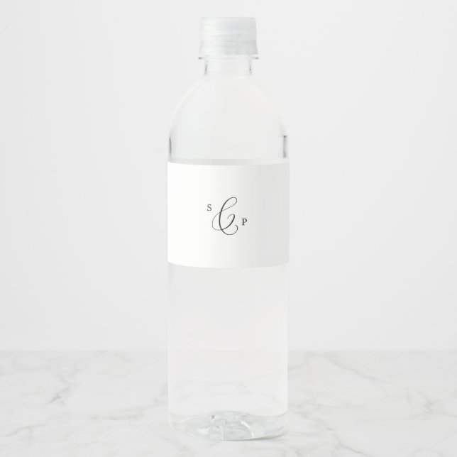 Delicate Black Calligraphy Monogram Wedding Water Bottle Label (Front)